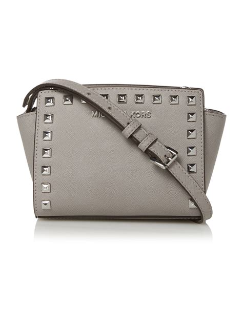 michael kors bag grey with silver|grey quilted cross body bag.